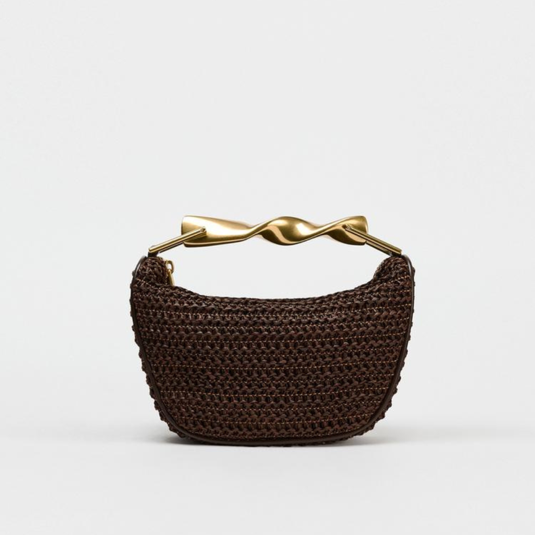 Braune Handtasche mit goldenem Griff