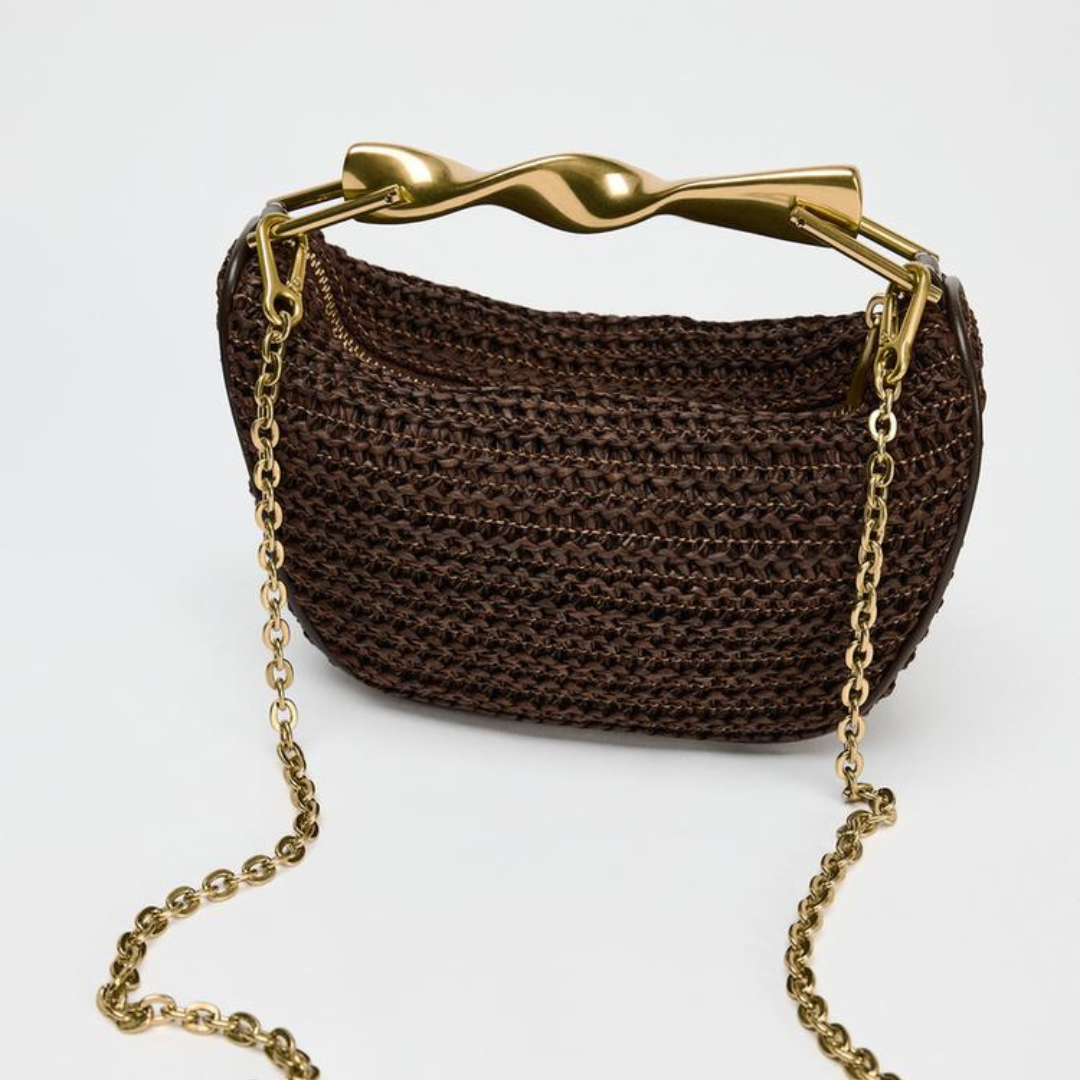 Braune Handtasche mit goldenem Griff