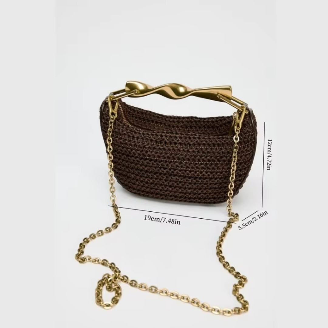 Braune Handtasche mit goldenem Griff